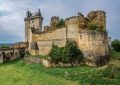 A majestic view of ancient castle ruins in Chinon, France, showcasing medieval architecture.